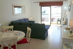 Woonkamer met balkon, vakantieappartement in Carvoeiro
